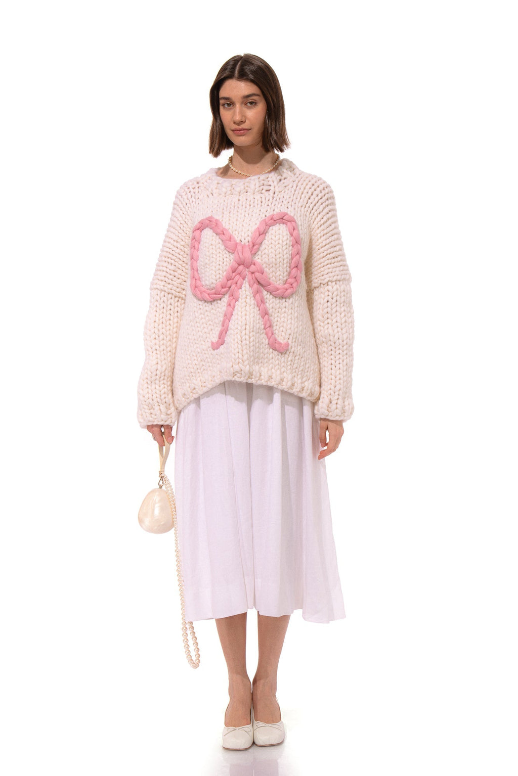 Klarza cream chunky knit sweater with pink bow – additional view 1