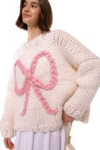 Klarza cream chunky knit sweater with pink bow – additional view 5